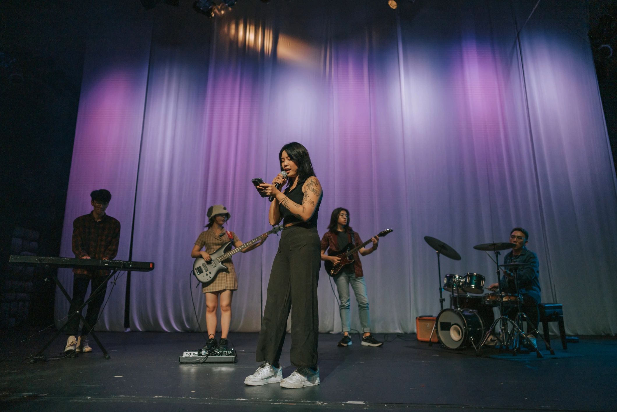 Live band performing during rehearsal